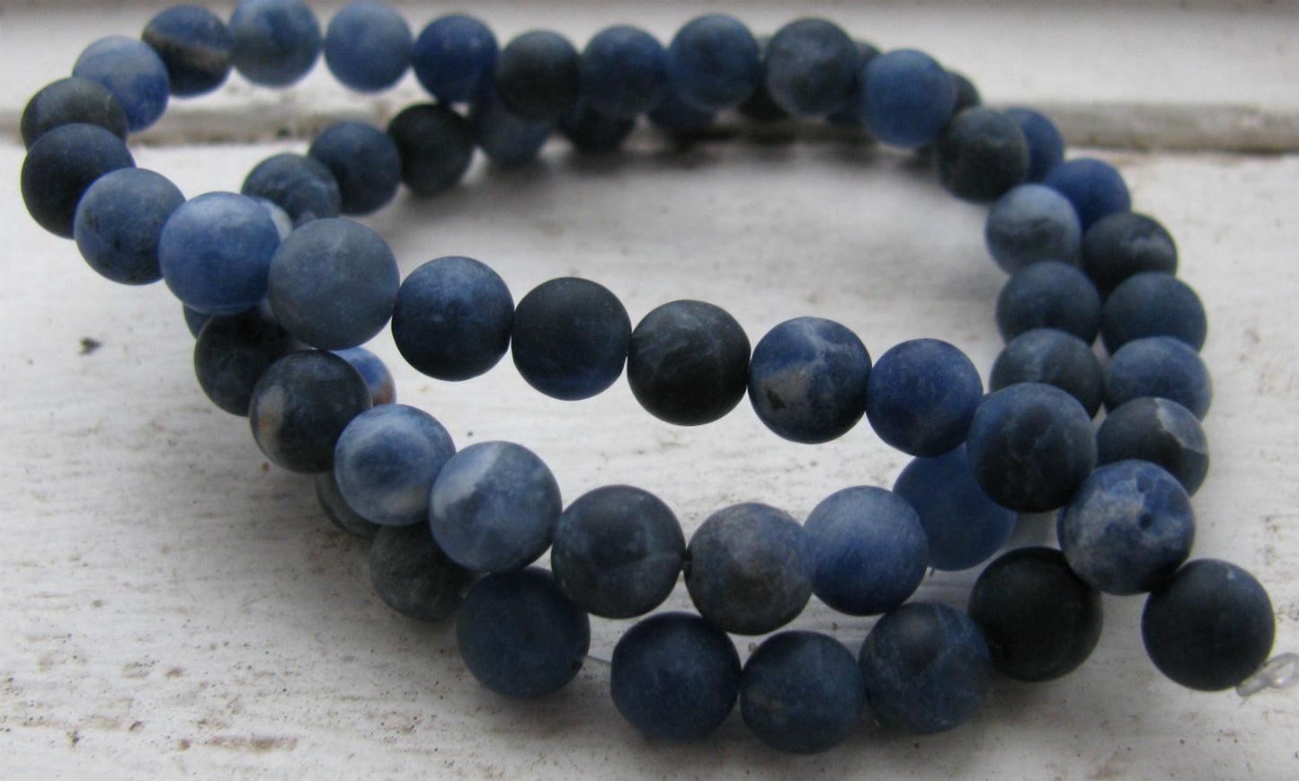 Sodalite - Rund frostad 6mm 1 sträng