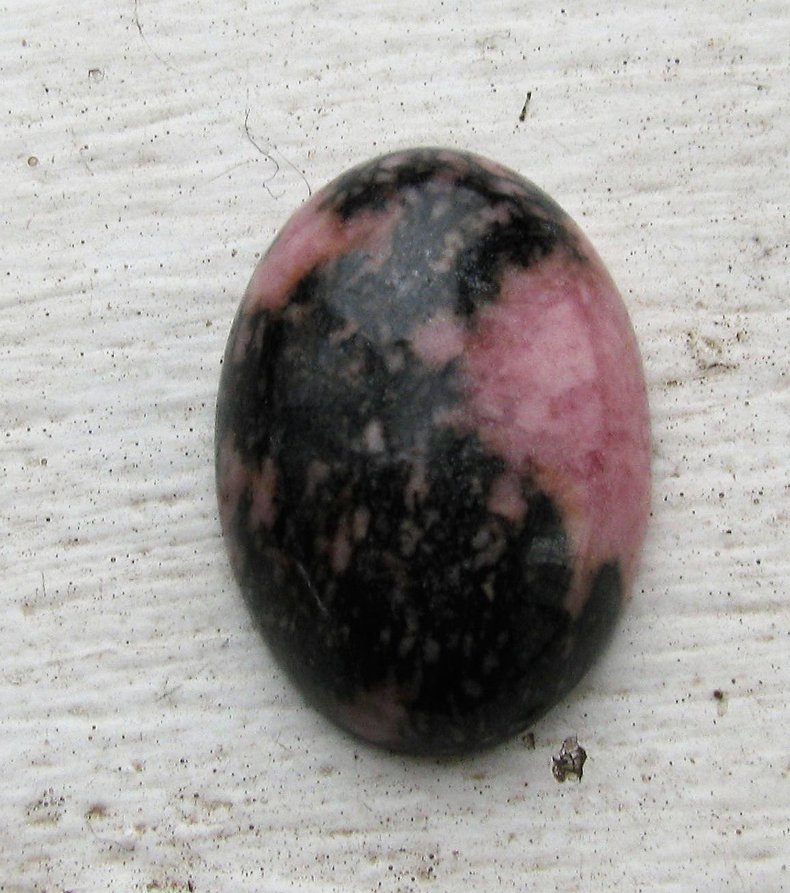 Cabochon Rhodonite - Oval 25x18mm 1 styck