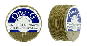 One-G pärltråd - Sand Ash 50 yards