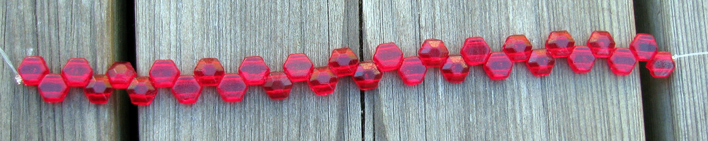 Honeycomb Jewel -  Ruby  6mm, 1 sträng