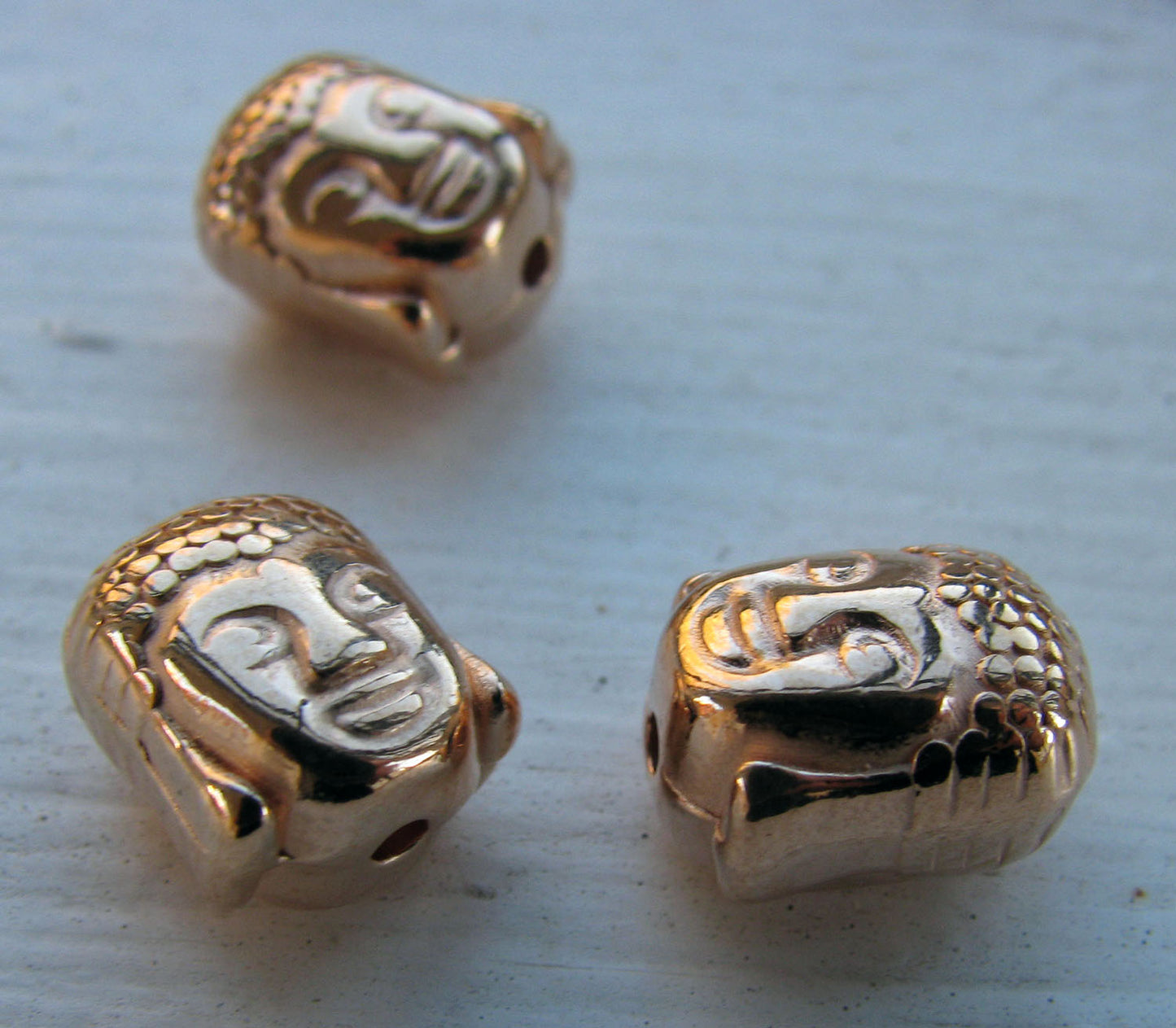 Mellandel Roséguldfärgad - Buddha huvud 10x8mm, 3-pack