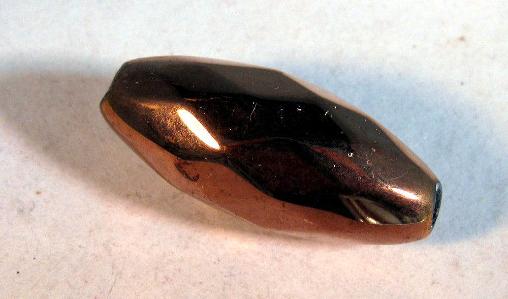 Facetterad glaspärla - Oval koppar,28x12mm