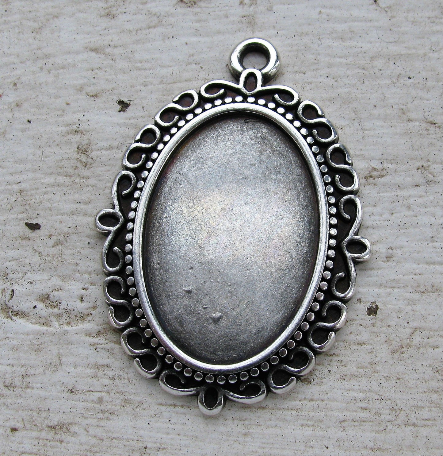 Ramberlock Silverfärgad - Oval sirlig 20x30mm, 1 styck