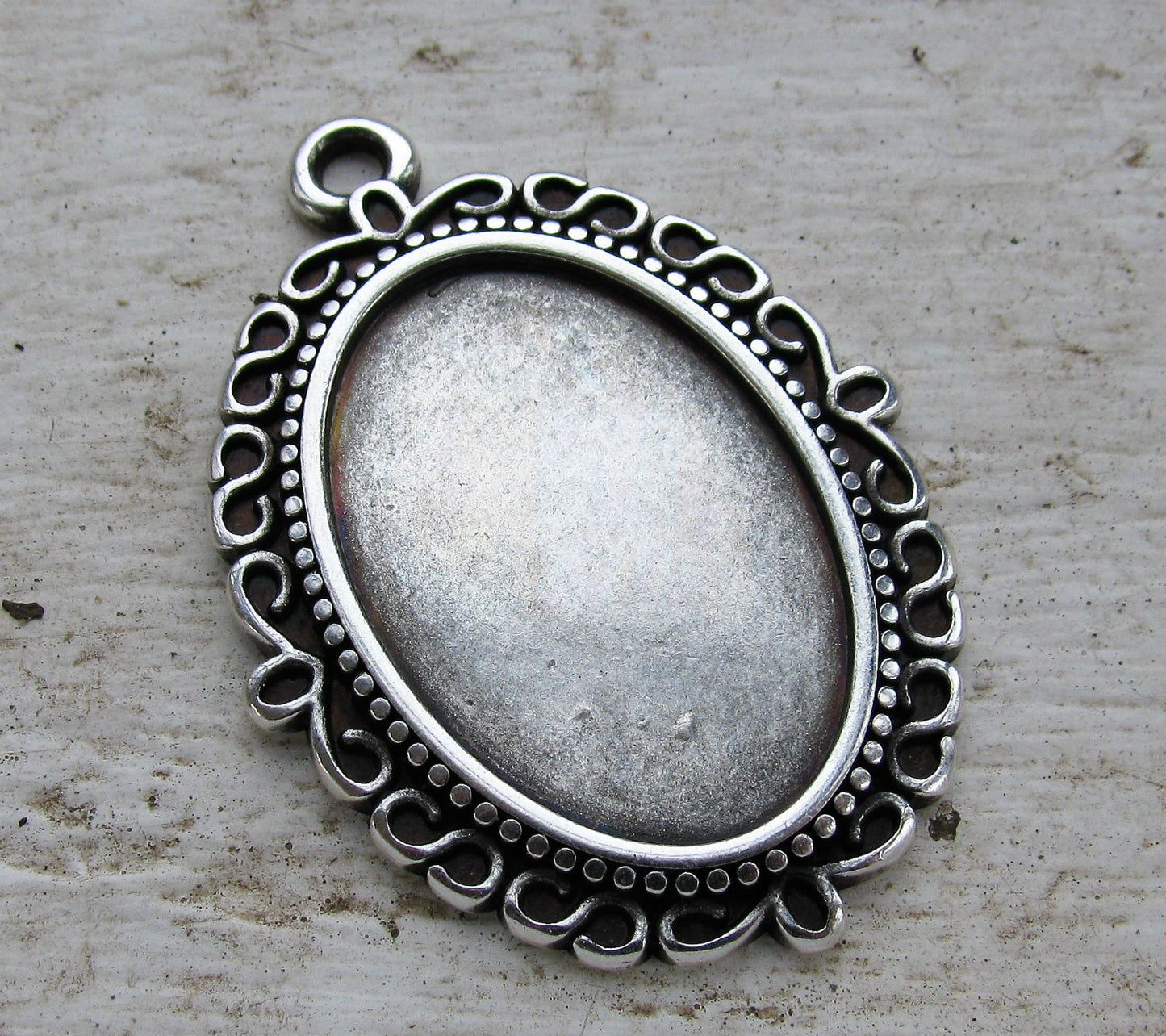 Ramberlock Silverfärgad - Oval sirlig 20x30mm, 1 styck