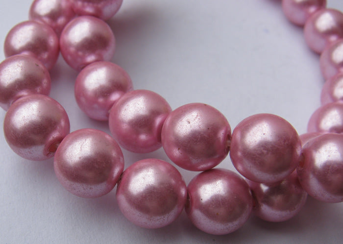 Vaxade glaspärlor - Rosa 10mm, 1 mindre sträng