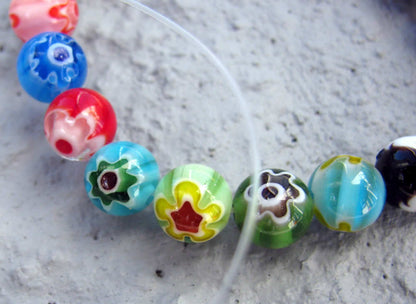 Glaspärlor Millefiori - Mix 8mm, 1 sträng