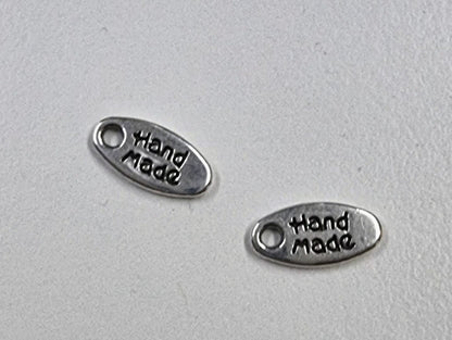 Berlock silverfärgad - Liten oval hand made 5x11mm 4-pack