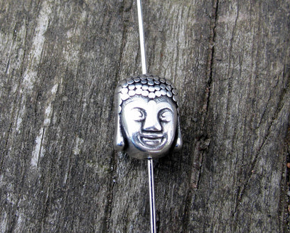 Mellandel Silverfärgad - Buddha huvud 10x8mm, 3-  pack