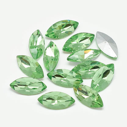 Kinesisk strass- Navette Peridot 10x5mm 1styck