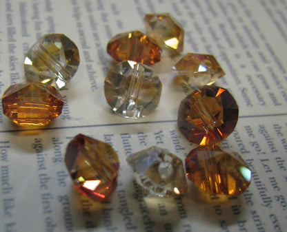 Facetterade glaspärlor - Diamantformade, Gul/orange med lyster, 6x8mm, 10- pack