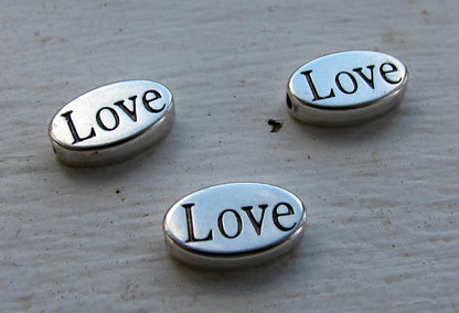 Mellandel silverfärgad - Oval LOVE, 3- pack