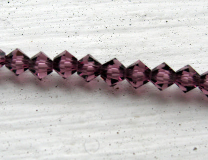 Tjeckiska MC Bicone - Amethyst, 4 mm