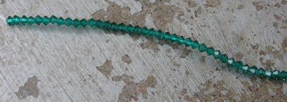 Tjeckiska MC Bicone - Emerald, 3 mm 1 sträng