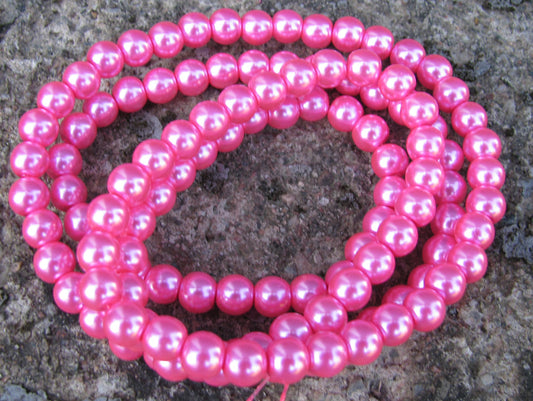 Vaxade glaspärlor - Cerise 8mm 1 sträng