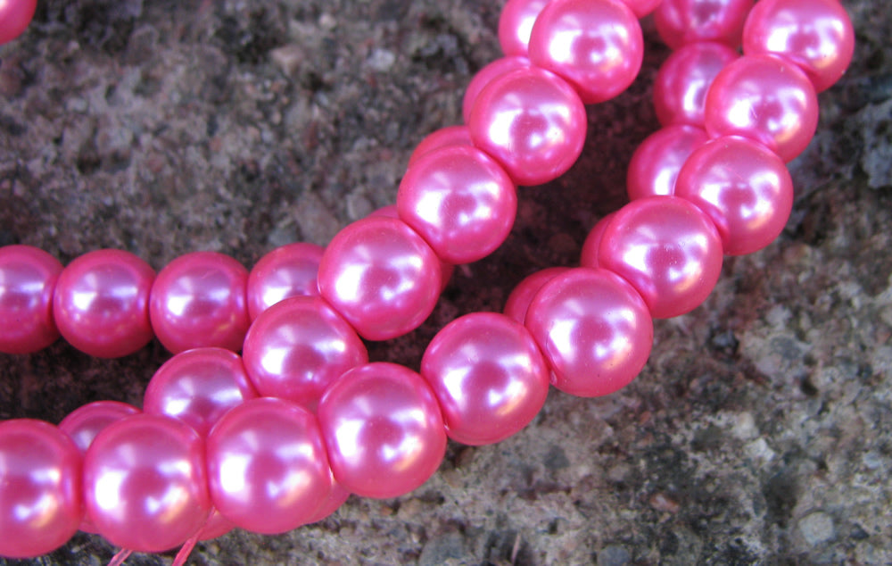 Vaxade glaspärlor - Cerise 8mm 1 sträng