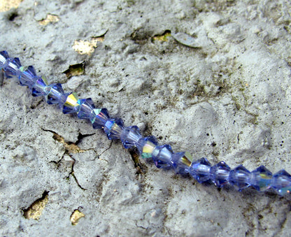 Tjeckiska MC Bicone - Tanzanite AB, 3 mm 1 sträng