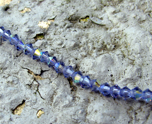 Tjeckiska MC Bicone - Tanzanite AB, 3 mm 1 sträng