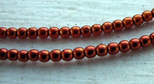 Tjeckiska vaxade glaspärlor - Copper 2mm, 1 sträng