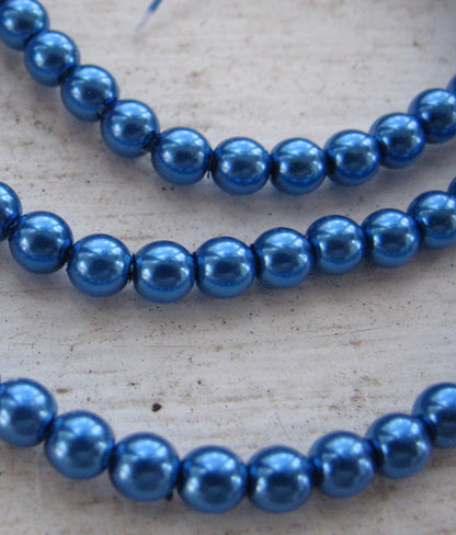 Tjeckiska vaxade glaspärlor - Persian Blue 4mm, 1 sträng