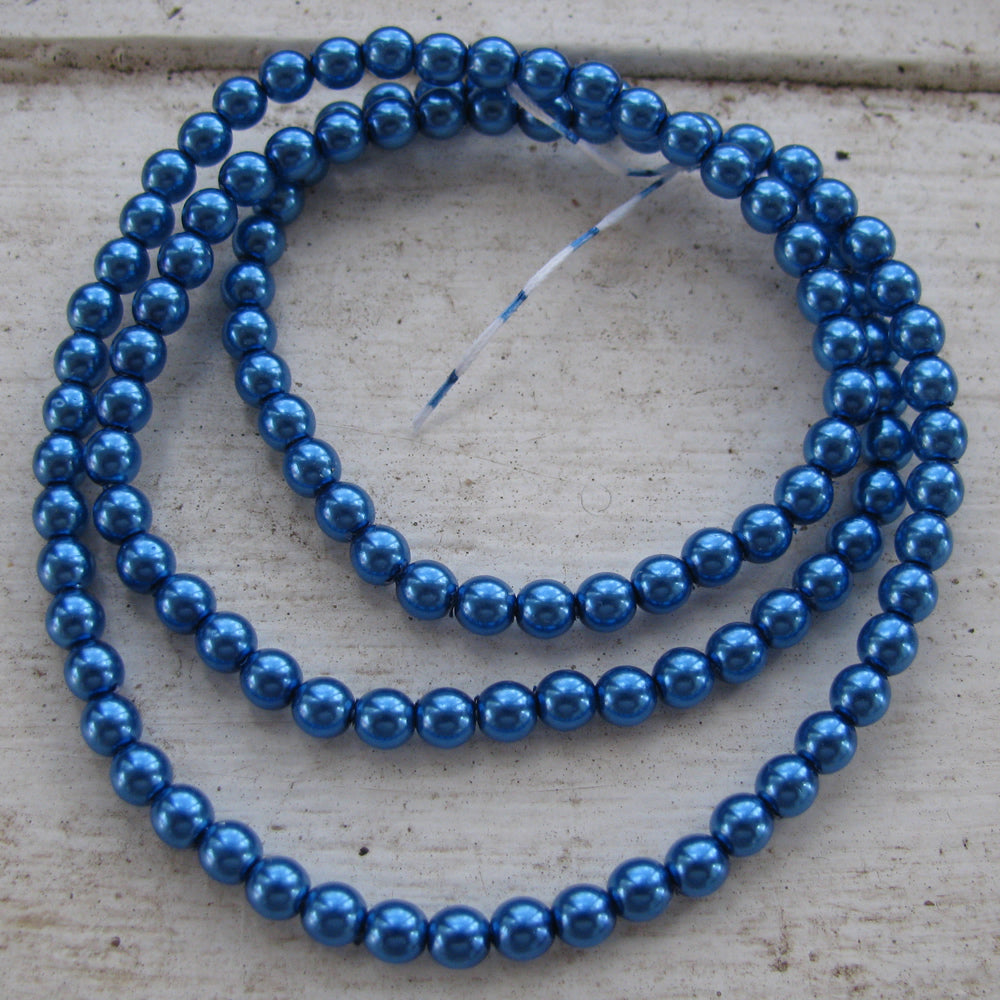 Tjeckiska vaxade glaspärlor - Persian Blue 4mm, 1 sträng