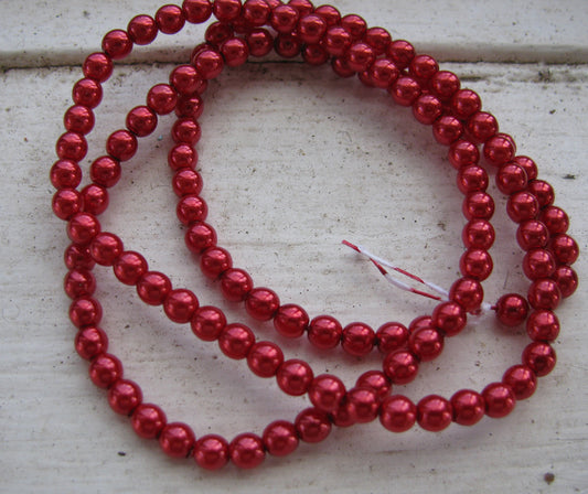 Tjeckiska vaxade glaspärlor - Xmas Red 4mm, 1 sträng