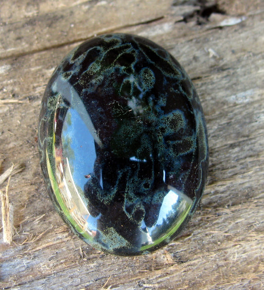 Cabochon Oval - Jet Picasso  25x18mm 1 styck