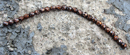 Tjeckiska Firepolish - Tweedy Copper 6mm, 1 sträng