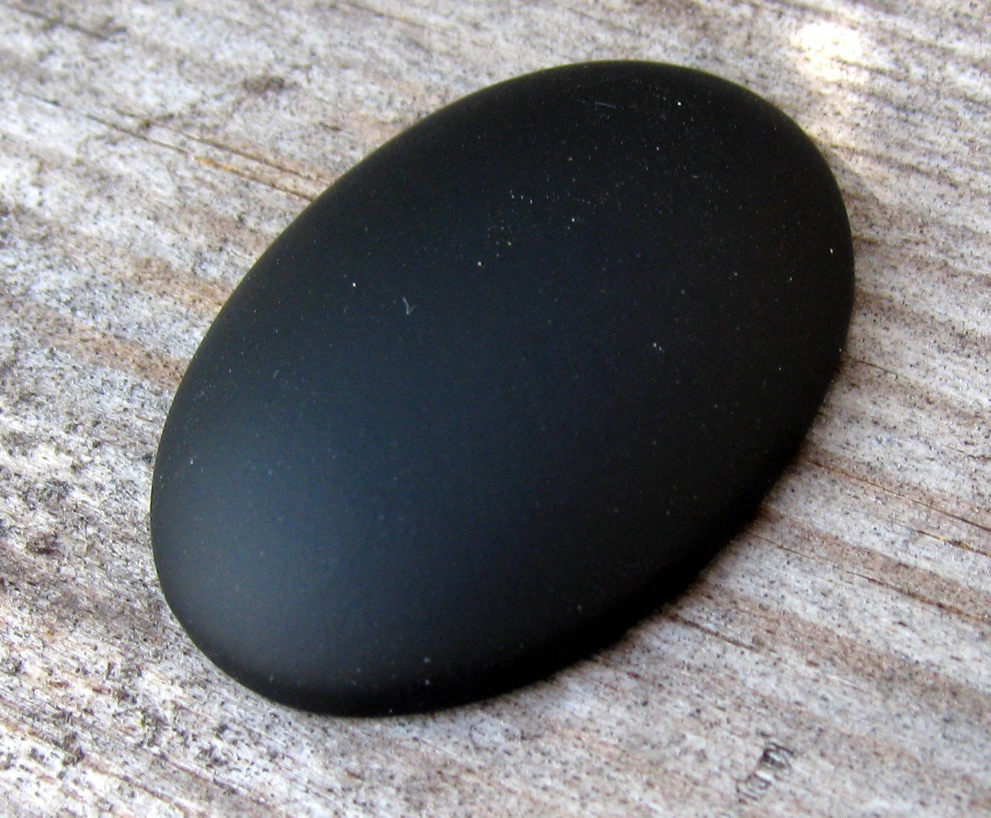 Luna Cabochon Oval - Opaque Black 25x18 mm, 1 styck