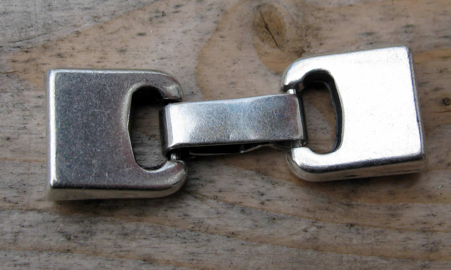 Lås silverfärgat -  Haklås för platta breda band 10x2,5mm, 1 set