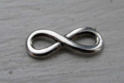 Connector infinity - Evighetstecken liten silverfärgad 15x6mm , 1 styck