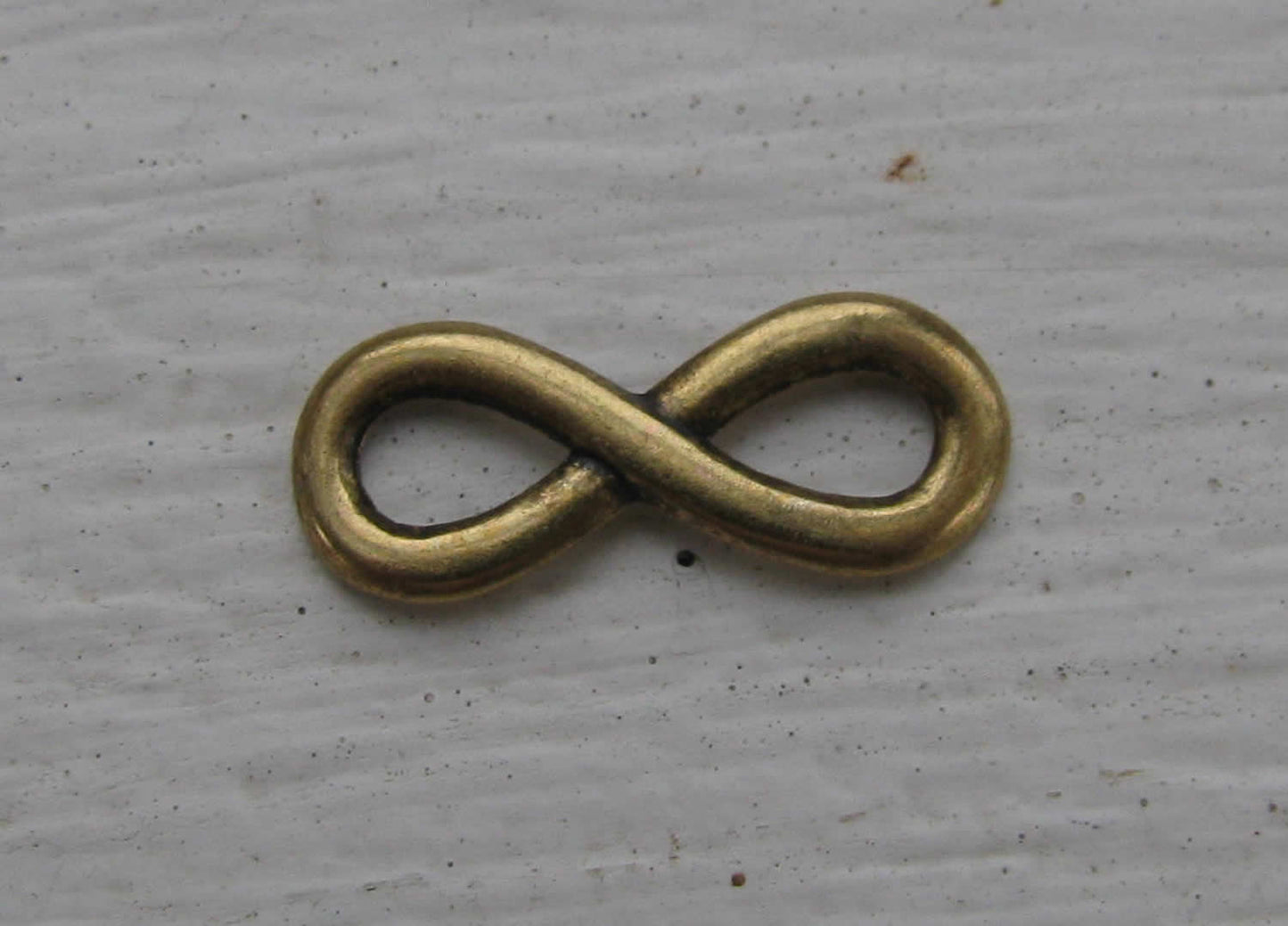 Connector infinity - Evighetstecken liten bronsfärgad 15x6mm , 1 styck