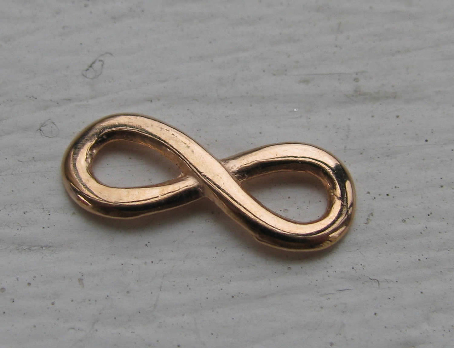 Connector infinity - Evighetstecken liten roséguldfärgad 15x6mm , 1 styck