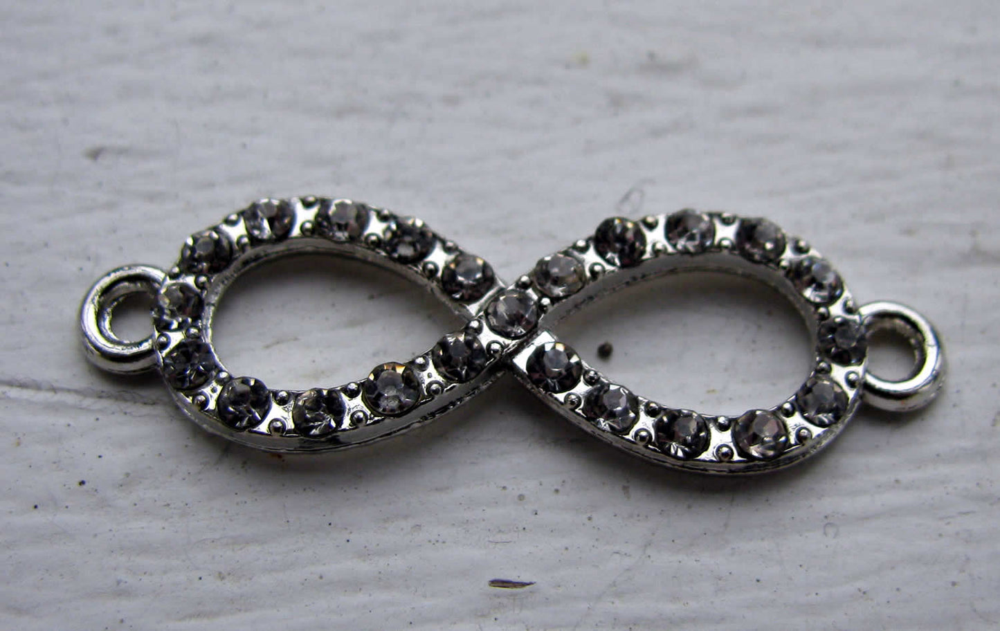 Connector infinity - Evighetstecken strass silverfärgad 33x10mm , 1 styck